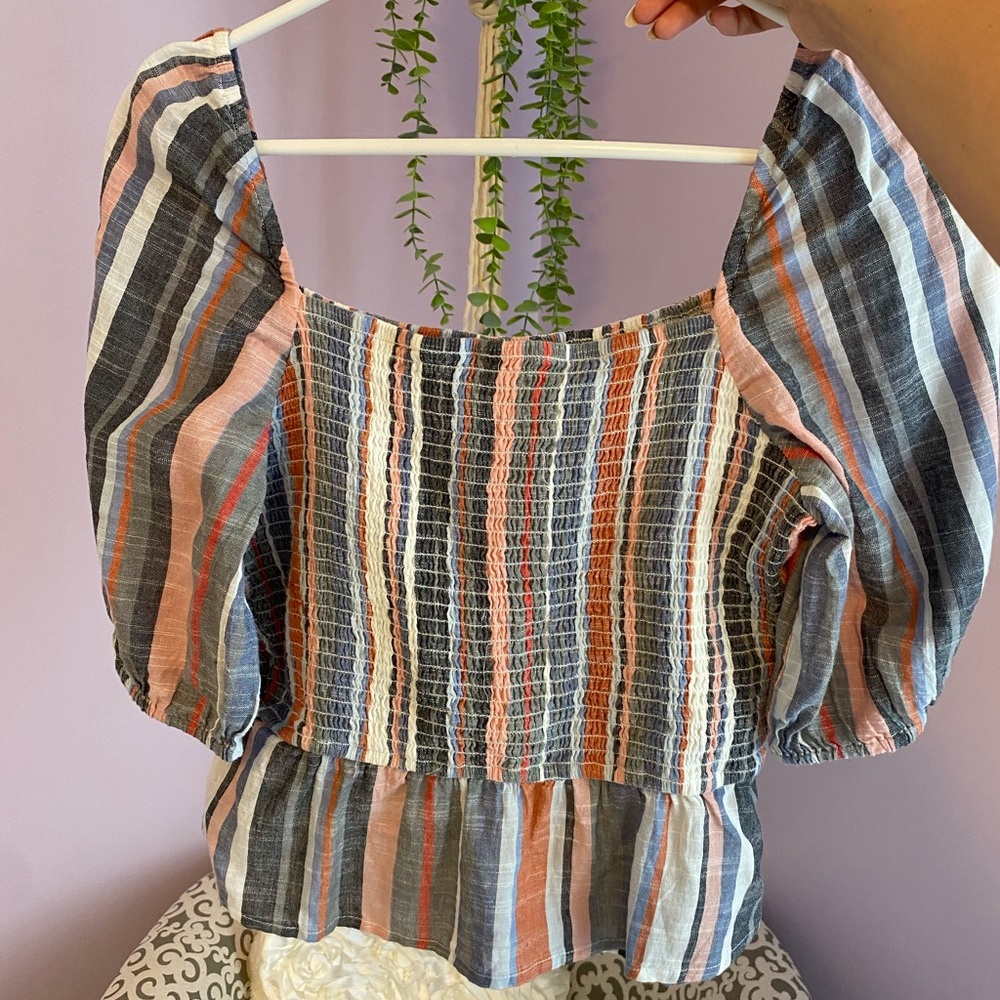 Francesca’s top-worn once